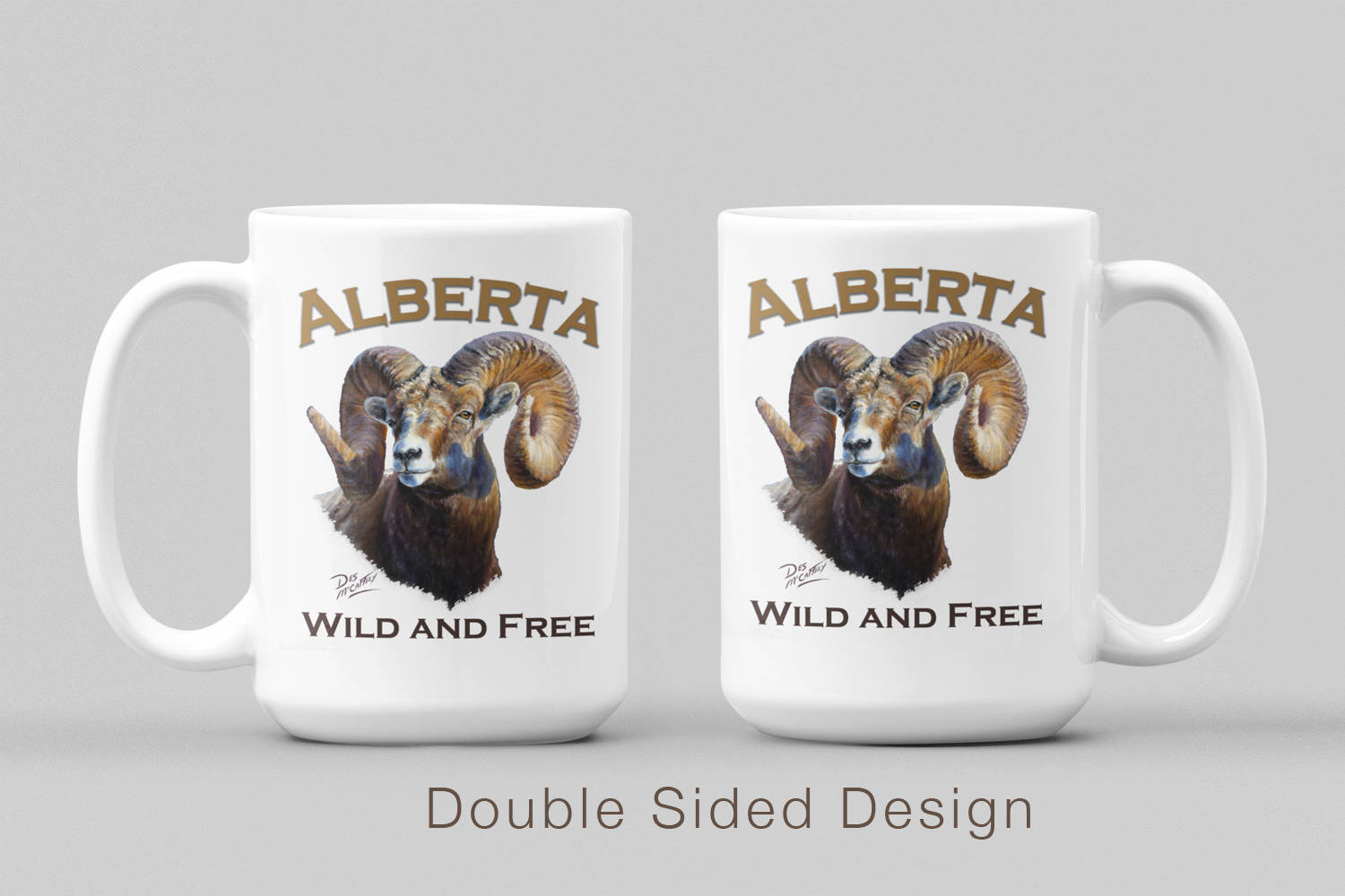 White ceramic 15 oz. mug titled Alberta Wild & Free, featuring Alberta's official animal, the bighorn sheep. Double sided design. 