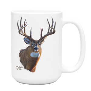 White ceramic coffee mug featuring a painting of a whitetail buck with large antlers, artwork by Canadian wildlife artist Des McCaffrey.